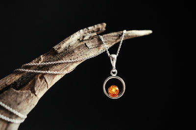 Circle of Radiance - Minimalist Silver Pendant with Baltic Amber