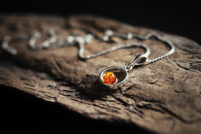 Circle of Radiance - Minimalist Silver Pendant with Baltic Amber