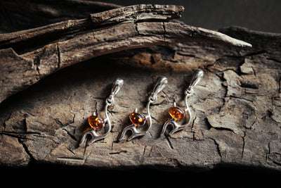 Feline Elegance - Silver Cat Pendant with Baltic Amber