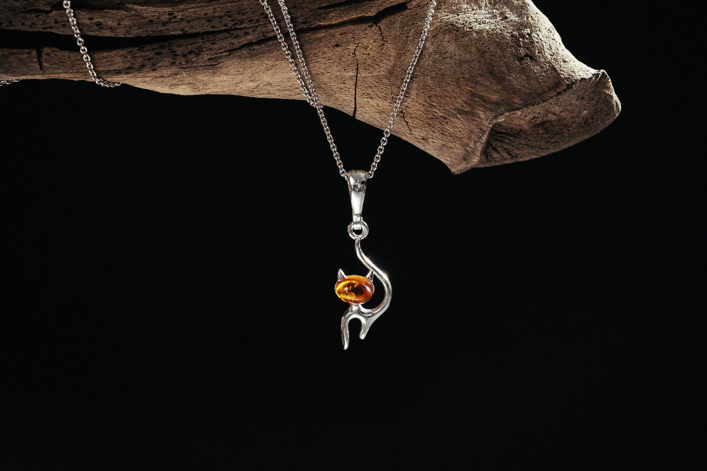 Feline Elegance - Silver Cat Pendant with Baltic Amber
