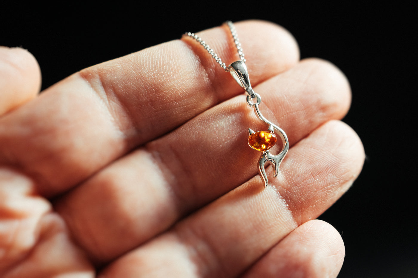 Feline Elegance - Silver Cat Pendant with Baltic Amber