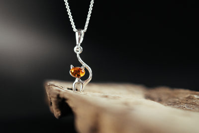 Feline Elegance - Silver Cat Pendant with Baltic Amber
