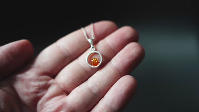 Circle of Radiance - Minimalist Silver Pendant with Baltic Amber